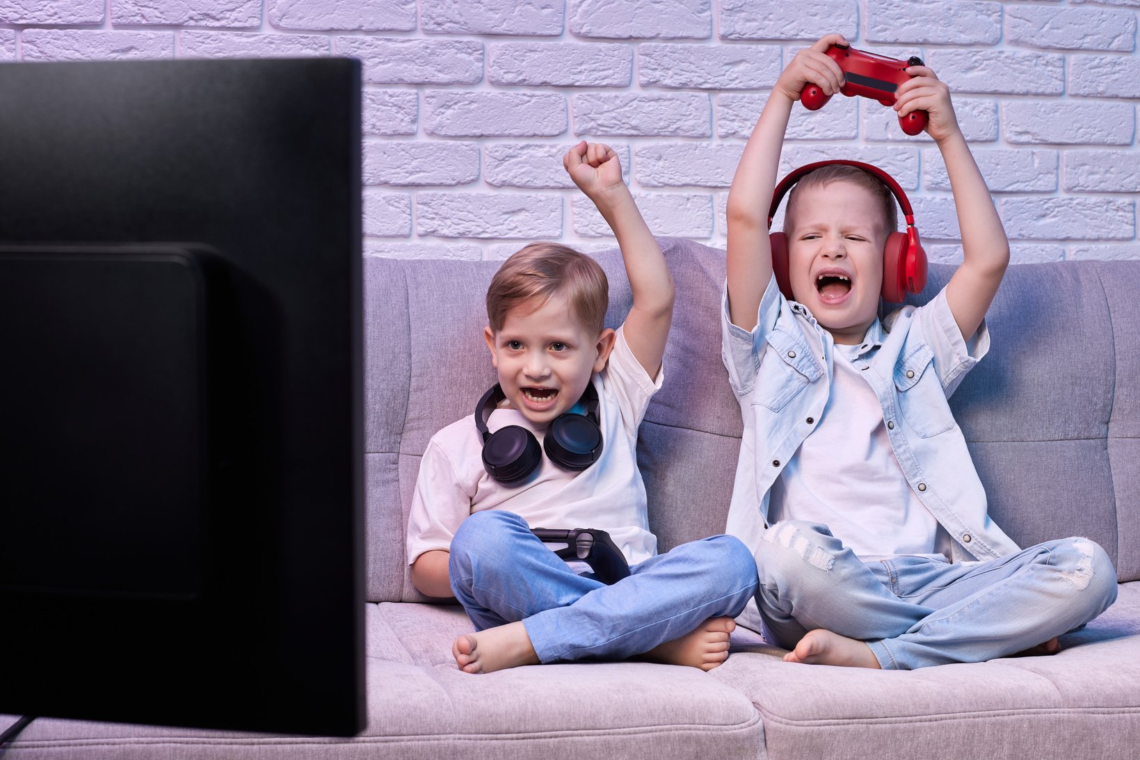 Children Playing Video Game with Game Console